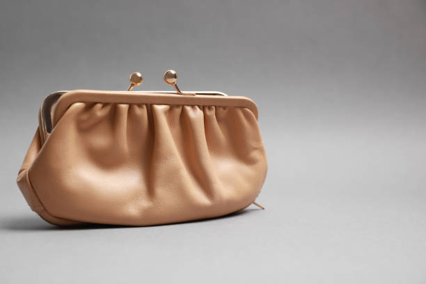 istock Stylish beige leather purse on light grey background. Space for text 1918028760