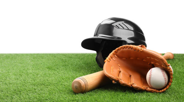 istock Baseball bat, ball, batting helmet and glove on artificial grass against white background, space for text 1918054115