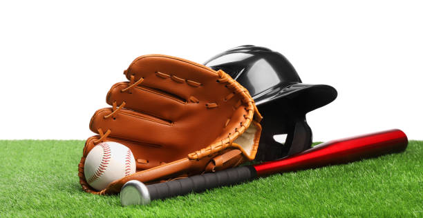 istock Baseball bat, ball, batting helmet and glove on artificial grass against white background 1918054312