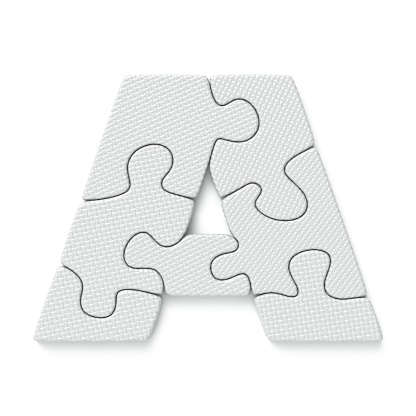 Close-up of three-dimensional polka dot alphabet letter C on white background.