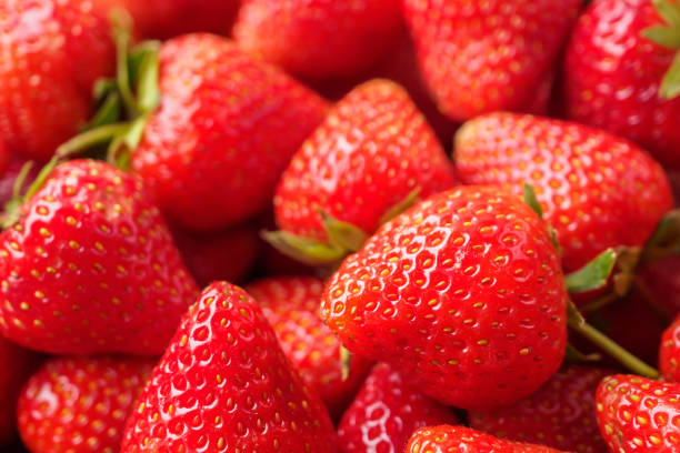 istock Fresh organic red strawberry fruit background 1918271244