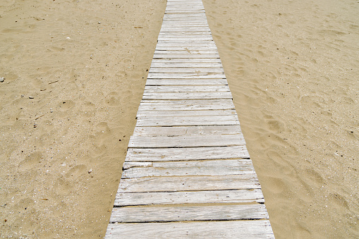 Wooden path on the beach.