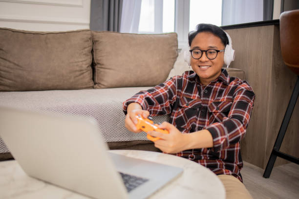 istock Young gamer playing esports 1918272798