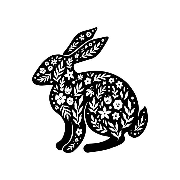 Easter floral rabbit silhouette in linocut style. Cute bunny shape, flower, leaves. Vector folk art illustration isolated on white background. Bloom linocut rabbit icon for logo, social media, print Easter floral rabbit silhouette in linocut style. Cute bunny shape, flower, leaves. Vector folk art illustration isolated on white background. Bloom linocut rabbit icon for logo, social media, print. silhouette of a black and white rabbit stock illustrations
