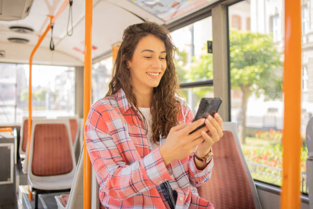 istock Young woman on public transportation 1918294194