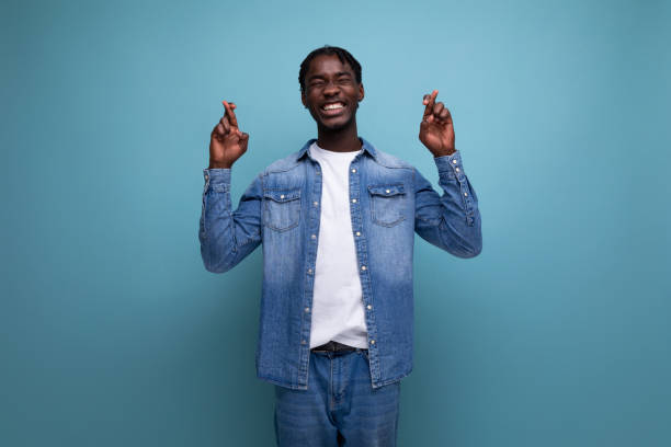 istock confident african young man with dreadlocks in casual denim jacket 1918298642