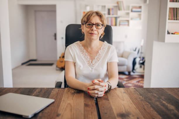 istock Woman sitting in modern office 1918334784