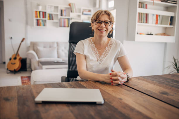 istock Woman sitting in modern office 1918335293