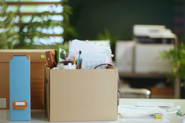 istock desk in modern green office 1918405428