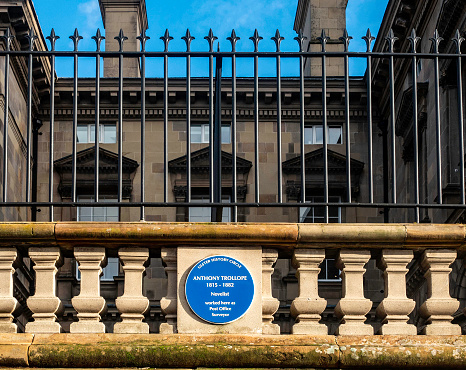 A plaque to Anthony Trollope, the novelist in Belfast, Northern Ireland. He was employed here as a Post Office Surveyor.