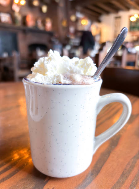 istock Hot Chocolate with Whipped Cream on Restaurant Table 1918432953