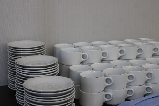 Row of White ceramic teapots at kitchenware store