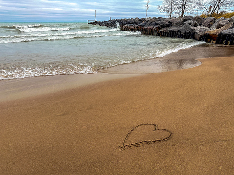 Heart drawn in the sand