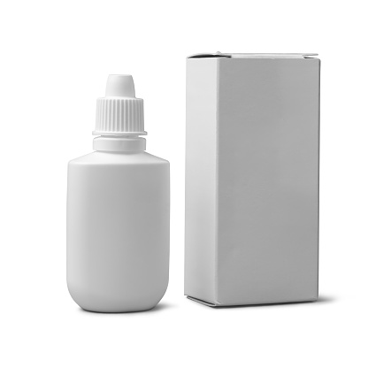 blank nasal spray bottle with its cardboard box, plastic bottle with medication squeezing droplets to treat allergies, congestion or sinusitis, mockup template isolated on white background