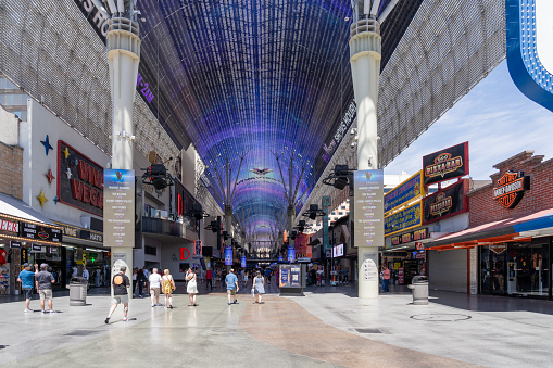 People visiting the Fremont Street Experience in Las Vegas, Nevada, USA, on May 30, 2023. The Fremont Street Experience is a pedestrian shopping mall and attraction in downtown Las Vegas.