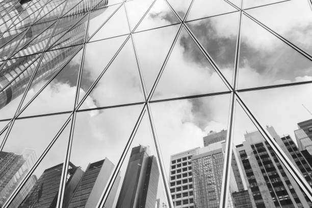 istock Reflection of urban skyline on modern office building 1918606827