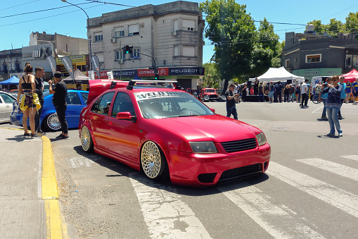 Buenos Aires, Argentina - Nov 6, 2022: Red Volkswagen Jetta sold in Argentina as Bora sedan 2000s, in the street at a classic car show