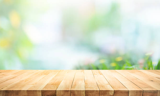 istock Selective focus.Wood table counter on blur flower garden background 1918693580