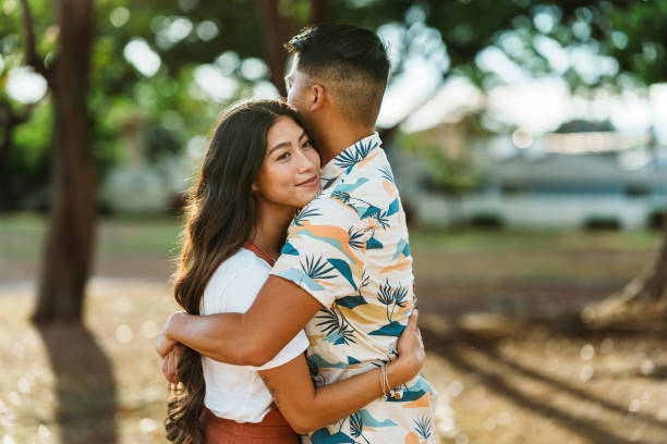 istock Affectionate Pacific Islander couple at the park 1918697220