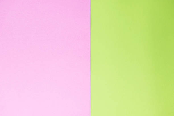 istock Green and pink pastel color paper background. 1918756653