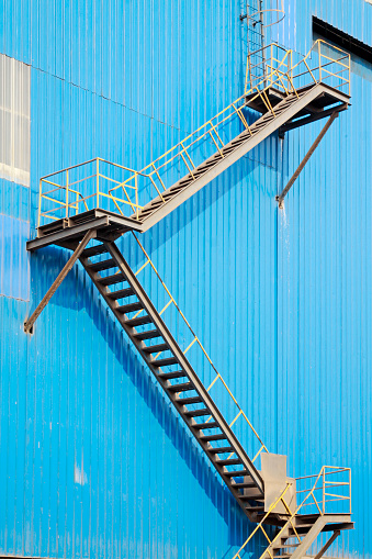 ladder outside the blue workshop, closeup of photo