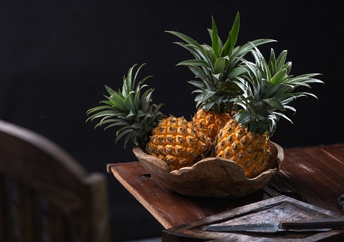 fresh pineapple in a darkmood still life photography photo concept