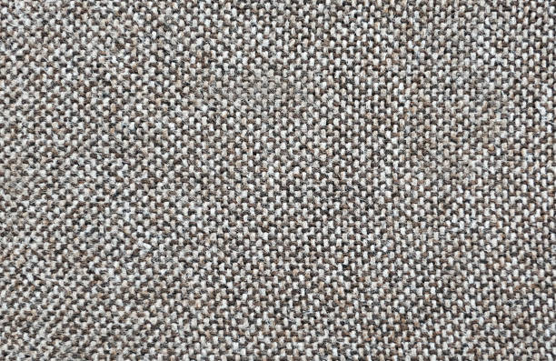 istock Beige cotton woven sofa cushion fabric texture background. 1918855669