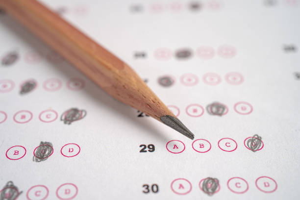 istock Answer sheets with pencil drawing fill to select choice, education concept. 1918880678