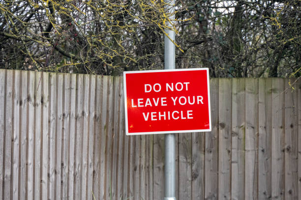 istock A red sign with white writing stating do not leave your vehicle, red warning sign 1918919176