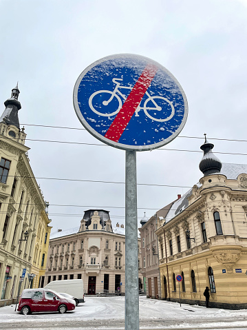 Ostrava, Czech Republic - January 07, 2024: Road sign prohibiting cycling with city background.