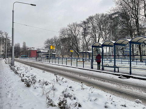 Ostrava, Czech Republic - January 07, 2024: Tram stop with timetable.