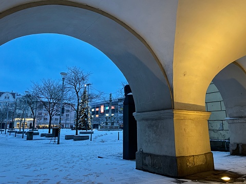 Ostrava, Czech Republic - January 07, 2024: View of the city centre square through the archway.