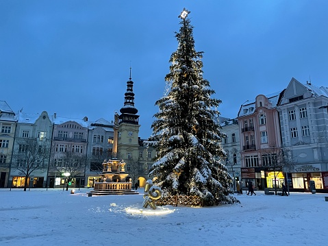 Ostrava, Czech Republic - January 07, 2024: Christmas tree near the town hall in the town square (Masaryk Square).