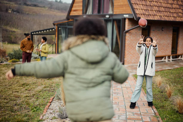 istock Playing with rugby ball in the backyard! 1918958661
