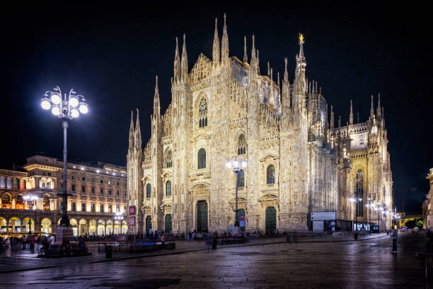 istock Holidays in Italy - Piazza Duomo in Milan by night 1918962398