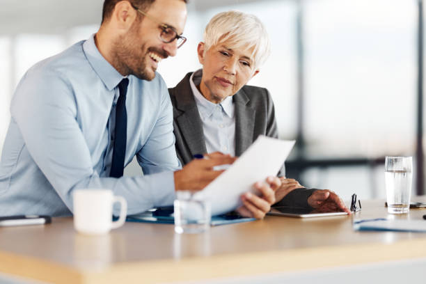 istock Business colleagues working on reports in the office. 1918982406