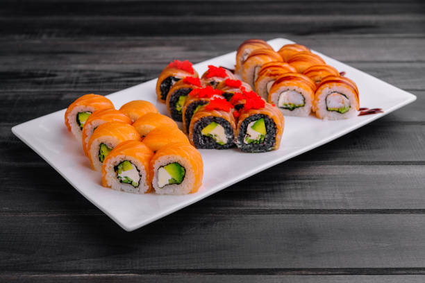 istock varios Philadelphia sushi rolls with salmon on a plate 1918995395