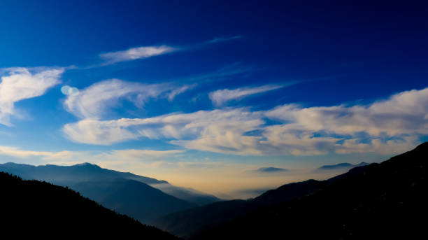 istock A tranquil day in the mountains clouds on the blue sky. Nature Landscape background 1919019611