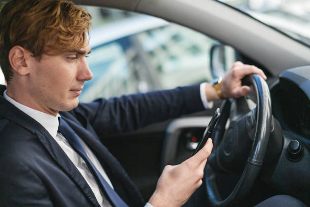 istock Business man portrait inside a car 1919027615