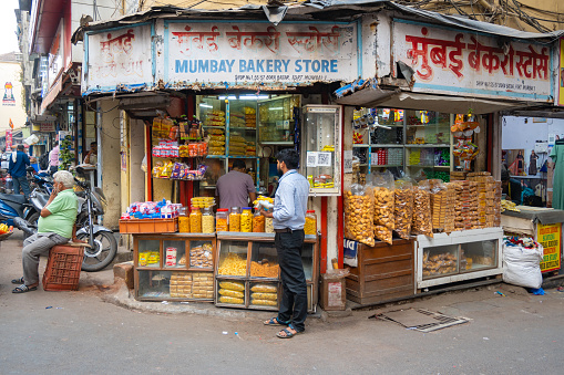Mumbai, Maharashtra, India, 1st of January 2024, Indian man at bakery in the street,