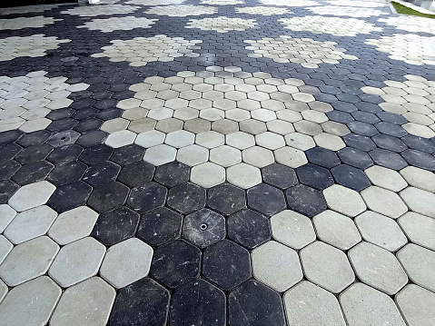 Black and white combination, hexagonal outdoor pavement stone floor tiles, sidewalk stone tiles background hexagonal pattern, black, white