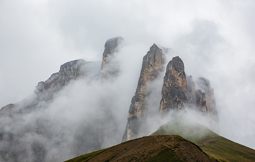 Dolomites landscape:Sella towers in the fog