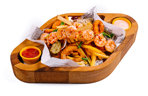 fried seafood plate on wooden tray