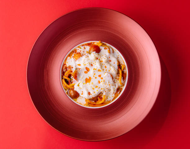 istock Italian spaghetti pasta with baked cherry tomatoes 1919087831
