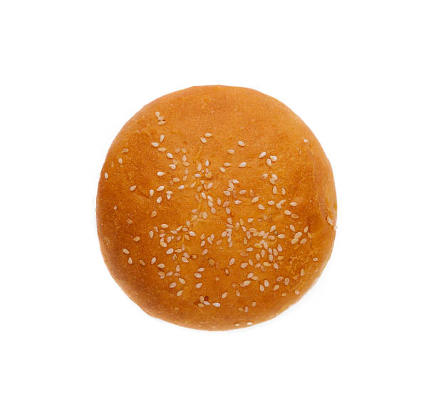 istock Fresh burger bun with sesame seeds isolated on top view 1919100798
