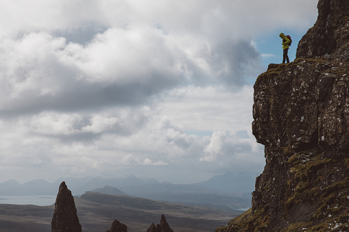 Silhouette of a man hiking in Scotland.