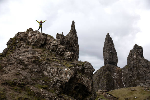 istock Man hiking Old Man of Storr 1919107339