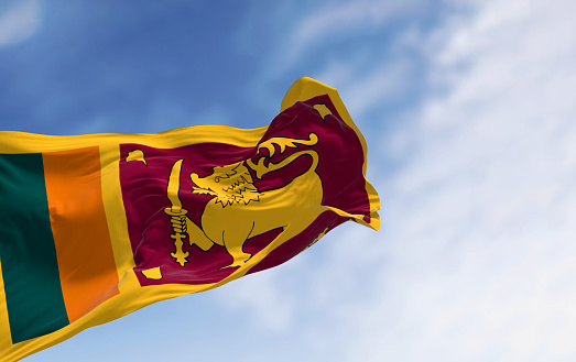 Sri Lanka national flag waving on a clear day. island country in South Asia, located in the Indian Ocean. 3d illustration redner. Rippling fabric