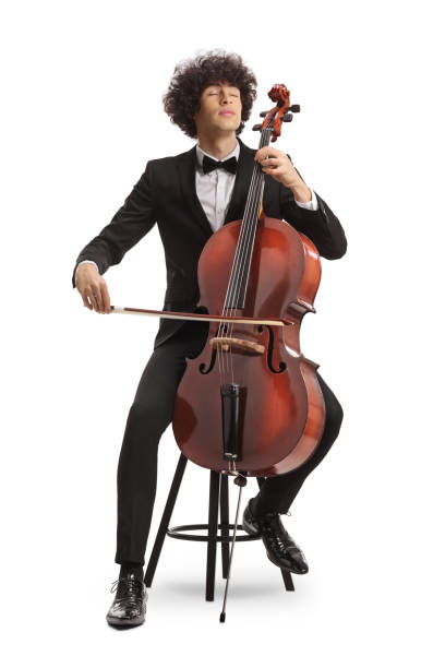 istock Young cellist sitting on a chair and playing 1919194108