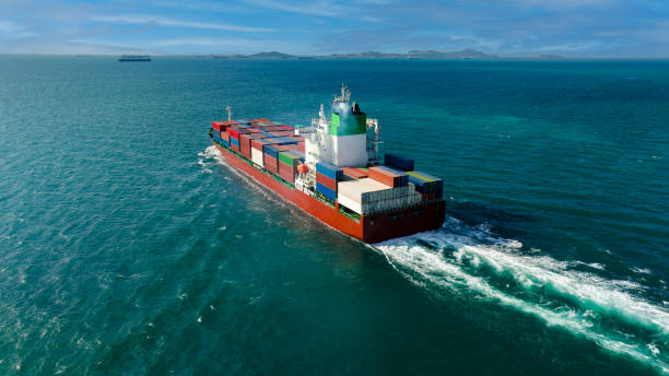 istock global business transportation, cargo logistic container ship sailing in sea  import export goods and distributing products to dealer and consumers worldwide, back view 1919215890